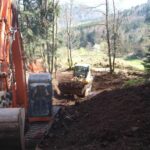 Pelleteuse en action lors de la réouverture d’une galerie aux Hautes-Mynes du Thillot